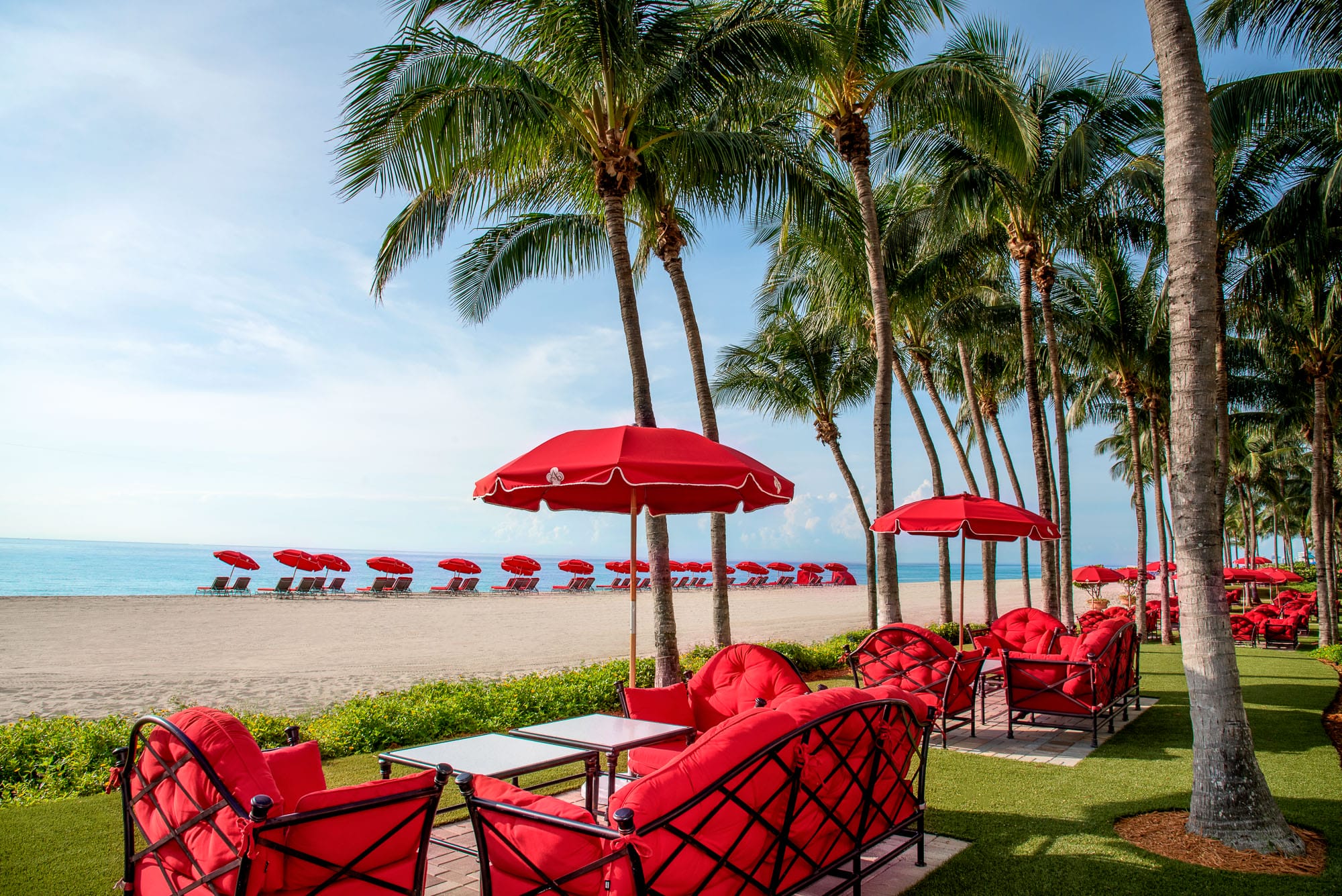 Acqualina's green lawn area and beach