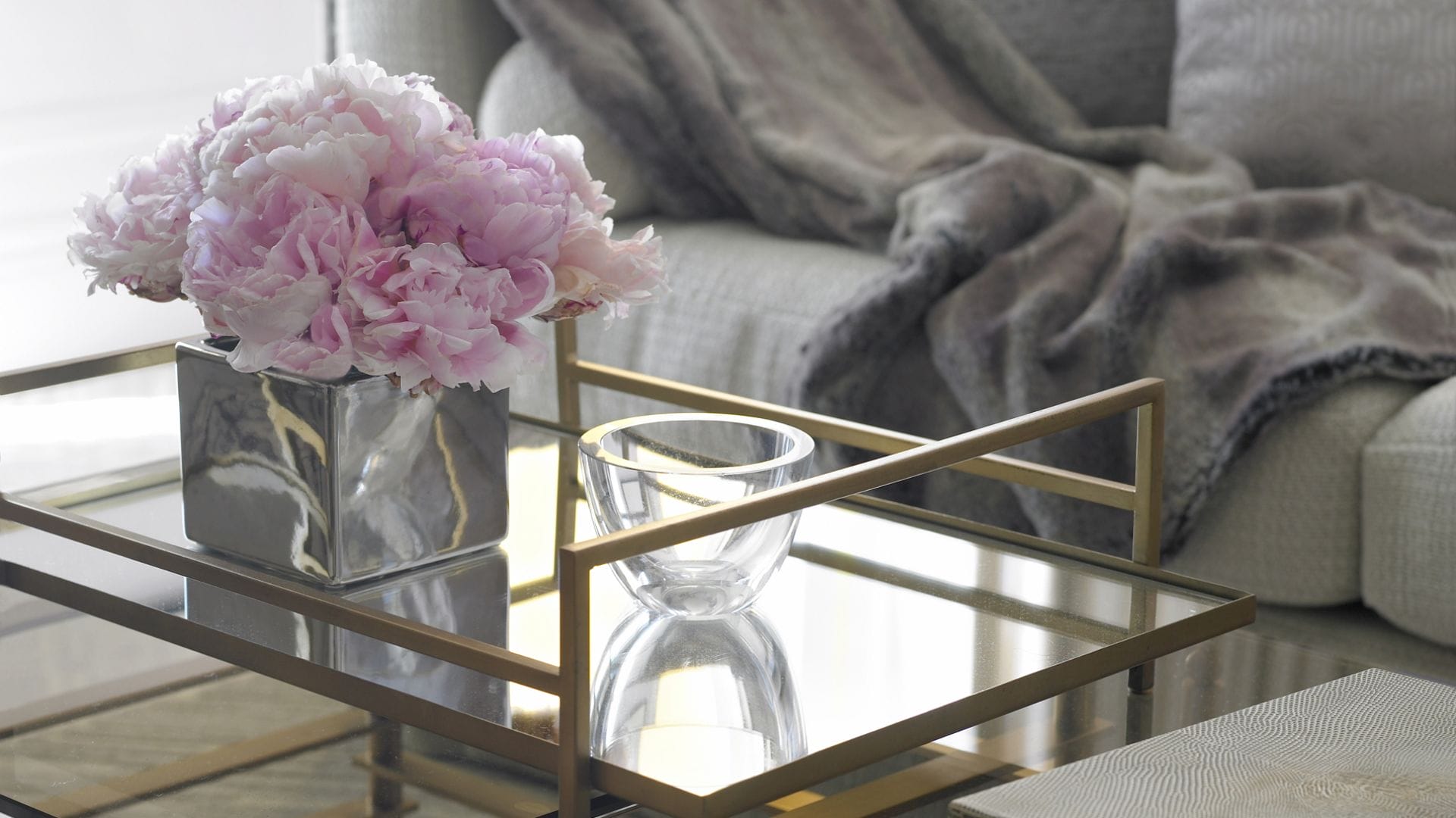 luxury hotel interior with flowers, glass decor and elegant tray